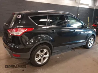 2014 Ford Escape SE with VIN 1FMCU0GX6EUE31877, listed as a IAAI auction lot 42080730 with 71,251 mi miles. Bid and sale history available at carsss.com. Image 4.