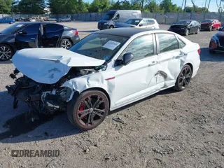 2019 Volkswagen Jetta GLI S z VIN 3VW6T7BU9KM177332, wystawiony jako IAAI lot #42197935 z przebiegiem 93 449 mil mil oraz . Historia ofert i sprzedaży dostępna na DreamBid. Obrazek 2.