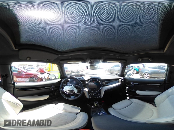 2023 MINI Hardtop Cooper SE with VIN WMW13DJ07P2S73739, listed as a IAAI auction lot 42542088 with 16,344 mi miles and . Bid and sale history available at DreamBid. Image 21.