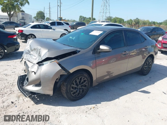 2019 Toyota Corolla L with VIN 5YFBURHE7KP878972, listed as a IAAI auction lot 42000888 with 201,612 mi miles. Bid and sale history available at carsss.com. Image 17.