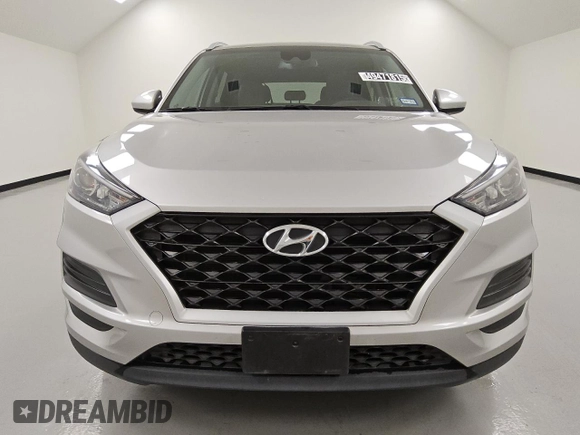 2021 Hyundai Tucson Value with VIN KM8J33A42MU392228, listed as a Copart auction lot 49471815 with 141,637 mi miles and Clean Title. Bid and sale history available at DreamBid. Image 5.