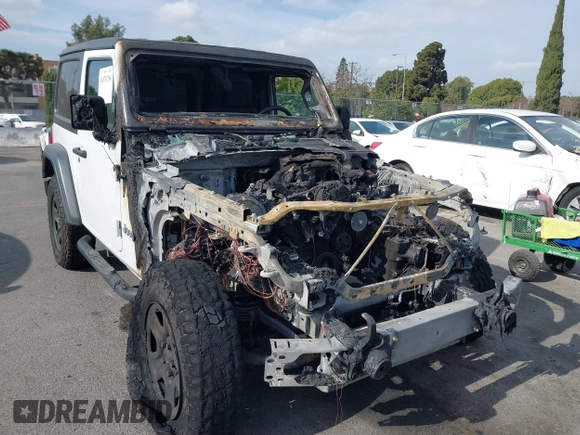 2018 Jeep Wrangler Sport S with VIN 1C4GJXAG0JW173936, listed as a IAAI auction lot 41070756 with Not Provided miles and . Bid and sale history available at DreamBid. Image 1.