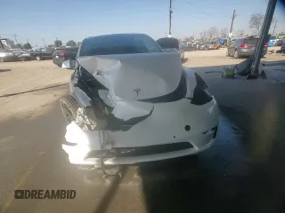 2022 Tesla Model Y Performance with VIN 7SAYGDEF8NF381644, listed as a Copart auction lot 44554585 with 71,413 mi miles and Salvage Title. Bid and sale history available at DreamBid. Image 11.