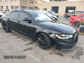 2012 Audi A6 3.0T Prestige with VIN WAUHGAFC2CN175036, listed as a IAAI auction lot 41410693 with 163,897 mi miles. Bid and sale history available at carsss.com. Image 1.