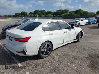 2021 BMW 3 Series 330i with VIN 3MW5R1J00M8B52627, listed as a IAAI auction lot 40722823 with 36,769 mi miles. Bid and sale history available at carsss.com. Image 4.