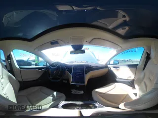 2015 Tesla Model S 85D with VIN 5YJSA1H48FF082038, listed as a IAAI auction lot 41712242 with 58,297 mi miles. Bid and sale history available at carsss.com. Image 18.