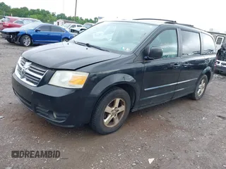 2009 Dodge Grand Caravan SXT z VIN 2D8HN54109R596185, wystawiony jako IAAI lot #42382133 z przebiegiem 207 882 mil mil oraz . Historia ofert i sprzedaży dostępna na DreamBid. Obrazek 2.
