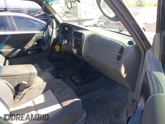 2005 Ford Ranger XL with VIN 1FTYR15E65PA07911, listed as a IAAI auction lot 42004544 with 232,262 mi miles. Bid and sale history available at carsss.com. Image 5.