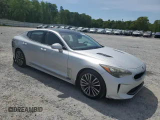 2018 Kia Stinger Premium with VIN KNAE25LAXJ6017479, listed as a Copart auction lot 53158595 with 120,273 mi miles and Salvage Title. Bid and sale history available at DreamBid. Image 4.