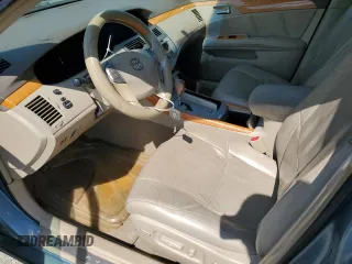 2005 Toyota Avalon XL z VIN 4T1BK36B95U005898, wystawiony jako Copart lot #54469595 z przebiegiem 176 901 mil mil oraz Szkoda całkowita • Salvage title. Historia ofert i sprzedaży dostępna na DreamBid. Obrazek 7.