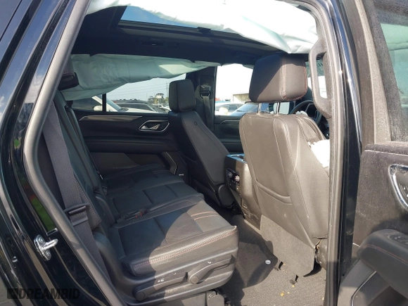 2023 Chevrolet Tahoe RST with VIN 1GNSCRKD3PR468757, listed as a IAAI auction lot 41557004 with 57,384 mi miles. Bid and sale history available at carsss.com. Image 8.