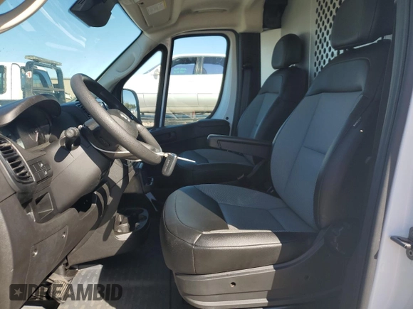 2023 Ram ProMaster Cargo with VIN 3C6LRVVG5PE527224, listed as a Copart auction lot 77179234 with 33,804 mi miles and Salvage Title. Bid and sale history available at DreamBid. Image 7.