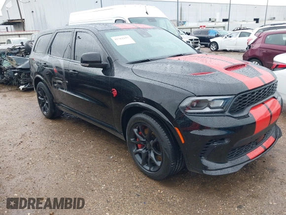 2023 Dodge Durango SRT Hellcat Premium with VIN 1C4SDJH99PC584770, listed as a IAAI auction lot 41562157 with 14,598 mi miles and . Bid and sale history available at DreamBid. Image 1.