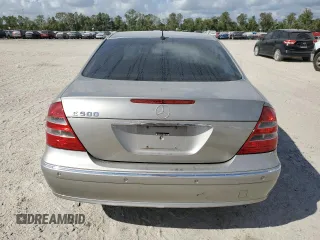 2003 Mercedes-Benz E-Class 5.0L with VIN WDBUF70J73A119596, listed as a Copart auction lot 77382424 with 237,620 mi miles and Salvage Title. Bid and sale history available at carsss.com. Image 6.