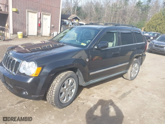 2009 Jeep Grand Cherokee Limited with VIN 1J8HR58T49C537818, listed as a IAAI auction lot 41845235 with 90,326 mi miles. Bid and sale history available at carsss.com. Image 2.