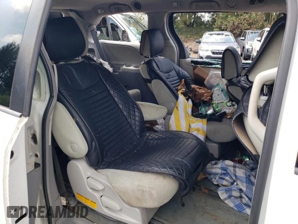 2014 Toyota Sienna L with VIN 5TDZK3DC8ES520037, listed as a Copart auction lot 54092715 with Not provided miles and Salvage title. Bid and sale history available at DreamBid. Image 11.