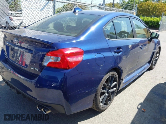 2021 Subaru WRX Premium with VIN JF1VA1C63M9814059, listed as a IAAI auction lot 42039228 with 87,437 mi miles. Bid and sale history available at carsss.com. Image 4.
