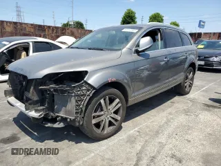 2015 Audi Q7 Premium Plus с VIN WA1LGAFE5FD012965, выставлен на аукционе Copart как лот 63712265 с пробегом 64 851 миль миль и Списание • Salvage title. История ставок и продаж доступна на DreamBid. Изображение 1.