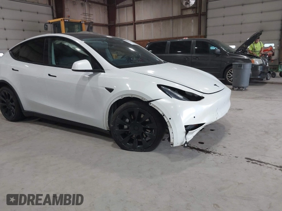 2020 Tesla Model Y Long Range z VIN 5YJYGDEE5LF041935, wystawiony jako IAAI lot #42369750 z przebiegiem 79 540 mil mil oraz . Historia ofert i sprzedaży dostępna na DreamBid. Obrazek 6.