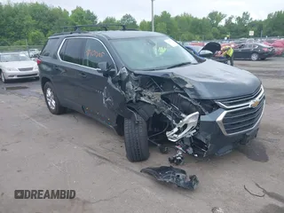 2021 Chevrolet Traverse LT with VIN 1GNEVHKW1MJ129878, listed as a IAAI auction lot 42367205 with 53,738 mi miles and . Bid and sale history available at DreamBid. Image 1.