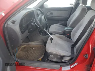 2001 Kia Sephia z VIN KNAFB121715066725, wystawiony jako Copart lot #86552964 z przebiegiem 76 915 mil mil oraz Tytuł czysty. Historia ofert i sprzedaży dostępna na DreamBid. Obrazek 7.