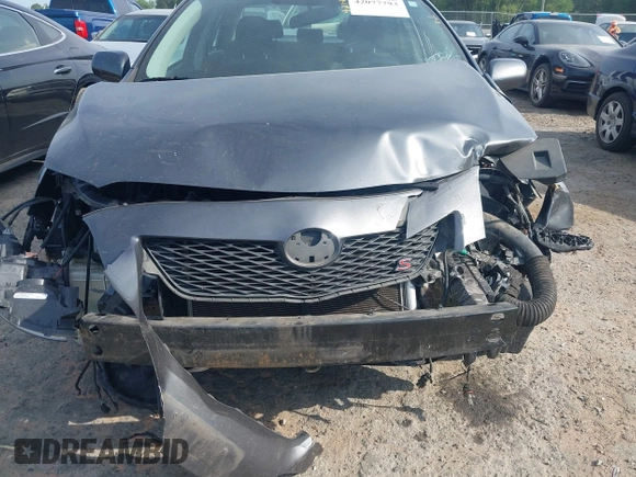2010 Toyota Corolla with VIN 2T1BU4EE7AC447067, listed as a IAAI auction lot 42077793 with 158,093 mi miles. Bid and sale history available at carsss.com. Image 11.