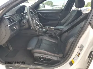 2015 BMW 4 Series 428i xDrive with VIN WBA4A7C53FD415066, listed as a Copart auction lot 61880545 with 130,874 mi miles and Salvage title. Bid and sale history available at DreamBid. Image 7.