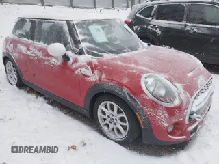 2016 MINI Hardtop S with VIN WMWXP7C54G2C61107, listed as a IAAI auction lot 41246730 with 37,146 mi miles and . Bid and sale history available at DreamBid. Image 1.