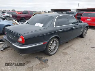 2007 Jaguar XJ with VIN SAJXA73C97TH14362, listed as a IAAI auction lot 41305716 with 120,924 mi miles and . Bid and sale history available at DreamBid. Image 4.