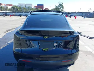 2021 Tesla Model Y Performance with VIN 5YJYGDEF9MF251738, listed as a IAAI auction lot 41708950 with 61,248 mi miles and . Bid and sale history available at DreamBid. Image 17.