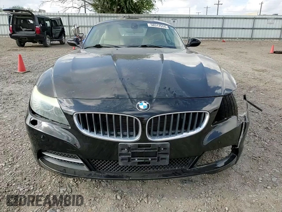 2011 BMW Z4 sDrive30i with VIN WBALM5C54BE378752, listed as a Copart auction lot 58517654 with 86,596 mi miles and Clean Title. Bid and sale history available at carsss.com. Image 11.
