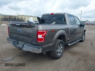 2020 Ford F-150 XL with VIN 1FTEW1EP1LFC03447, listed as a IAAI auction lot 42626026 with 111,525 mi miles and . Bid and sale history available at DreamBid. Image 4.