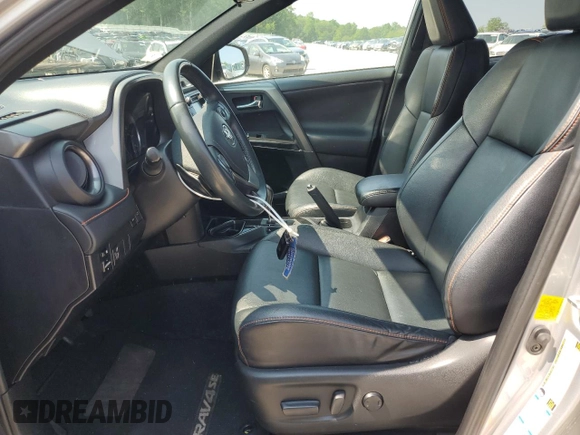 2016 Toyota RAV4 SE with VIN 2T3JFREV4GW531364, listed as a Copart auction lot 60031585 with 147,741 mi miles and Salvage title. Bid and sale history available at DreamBid. Image 7.
