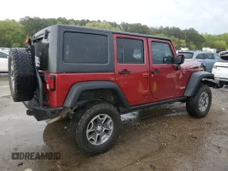 2013 Jeep Wrangler Unlimited Rubicon with VIN 1C4HJWFG6DL565462, listed as a Copart auction lot 51333785 with 113,601 mi miles and Salvage title. Bid and sale history available at DreamBid. Image 3.
