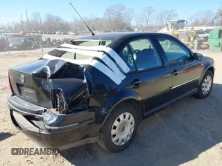 2004 Volkswagen Jetta GL with VIN 3VWRK69MX4M112945, listed as a IAAI auction lot 41342623 with Not provided miles and . Bid and sale history available at DreamBid. Image 4.