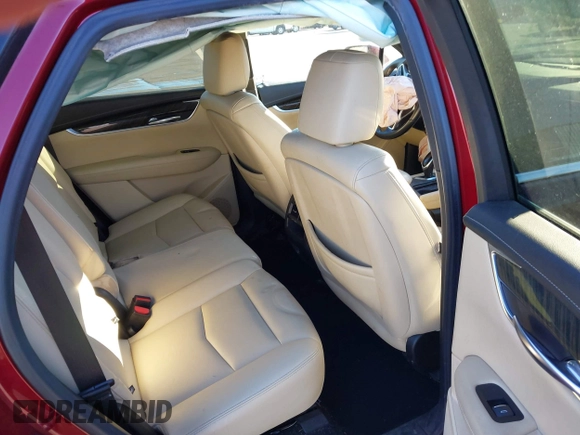 2018 Cadillac XT5 FWD with VIN 1GYKNARS4JZ211455, listed as a IAAI auction lot 41257536 with 102,032 mi miles and . Bid and sale history available at DreamBid. Image 8.