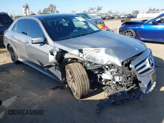 2014 Mercedes-Benz E E 350 Sport with VIN WDDHF5KB1EA979547, listed as a IAAI auction lot 42000619 with 128,104 mi miles. Bid and sale history available at carsss.com. Image 1.
