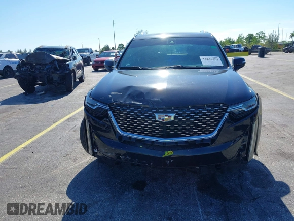 2020 Cadillac XT6 FWD Premium Luxury with VIN 1GYKPCRS7LZ211197, listed as a IAAI auction lot 42231424 with 57,351 mi miles and . Bid and sale history available at DreamBid. Image 12.