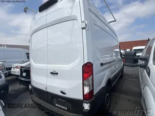 2023 Ford Transit Cargo z VIN 1FTBR1X80PKC02609, wystawiony jako IAAI lot #42845487 z przebiegiem 6 879 mil mil oraz . Historia ofert i sprzedaży dostępna na DreamBid. Obrazek 2.
