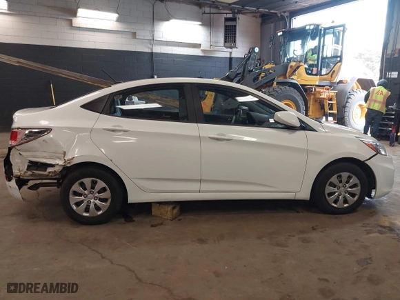 2015 Hyundai Accent GLS with VIN KMHCT4AE8FU876771, listed as a IAAI auction lot 42007229 with 63,484 mi miles. Bid and sale history available at carsss.com. Image 13.