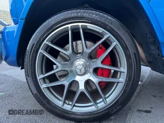 2022 Mercedes-Benz G 63 AMG z VIN W1NYC7HJ1NX437545, wystawiony jako Copart lot #66024305 z przebiegiem 9 650 mil mil oraz Czysty tytuł • Clean title. Historia ofert i sprzedaży dostępna na DreamBid. Obrazek 14.