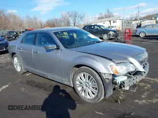 2014 Chrysler 300 C with VIN 2C3CCAKG2EH273274, listed as a IAAI auction lot 41638665 with 164,888 mi miles and . Bid and sale history available at carsss.com. Image 1.