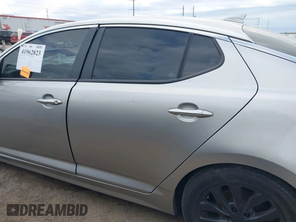 2015 Kia Optima LX with VIN 5XXGM4A70FG443696, listed as a IAAI auction lot 41962823 with 191,533 mi miles. Bid and sale history available at carsss.com. Image 14.