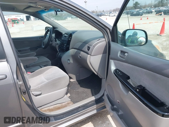 2005 Toyota Sienna CE with VIN 5TDZA23C35S308645, listed as a IAAI auction lot 42018335 with 228,214 mi miles. Bid and sale history available at carsss.com. Image 5.