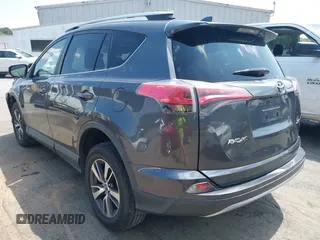2018 Toyota RAV4 XLE with VIN JTMWFREV9JJ201845, listed as a IAAI auction lot 42442303 with 111,177 mi miles and . Bid and sale history available at DreamBid. Image 3.