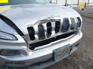 2014 Jeep Cherokee Altitude with VIN 1C4PJMCB2EW172275, listed as a IAAI auction lot 41923246 with 197,274 mi miles and . Bid and sale history available at DreamBid. Image 17.