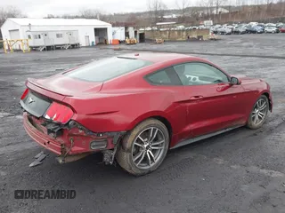 2016 Ford Mustang EcoBoost with VIN 1FA6P8TH3G5219477, listed as a IAAI auction lot 41791712 with 77,209 mi miles and . Bid and sale history available at carsss.com. Image 4.