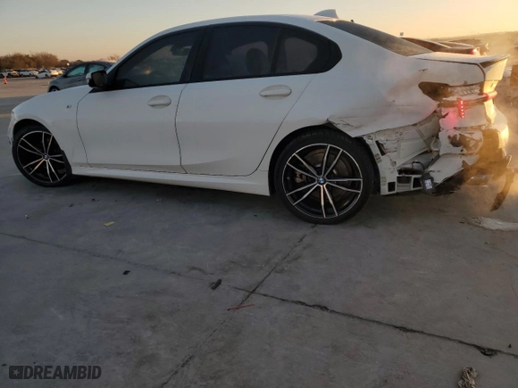 2020 BMW 3 Series 330i with VIN WBA5R1C07LFH41034, listed as a Copart auction lot 85256874 with 64,774 mi miles and Salvage Title. Bid and sale history available at carsss.com. Image 2.