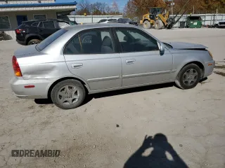 2005 Hyundai Accent GLS with VIN KMHCG45C75U638812, listed as a Copart auction lot 77968234 with 130,815 mi miles and Salvage Title. Bid and sale history available at carsss.com. Image 3.