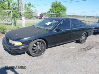 1996 Chevrolet Caprice Classic 1SA Special Value Pkg with VIN 1G1BL52PXTR141223, listed as a IAAI auction lot 41693524 with 1 mi miles. Bid and sale history available at carsss.com. Image 2.